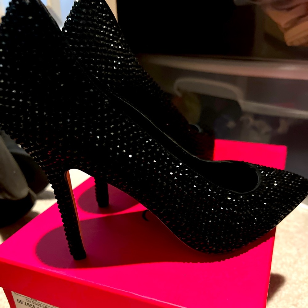 Isa Tapia black suede and stone heels